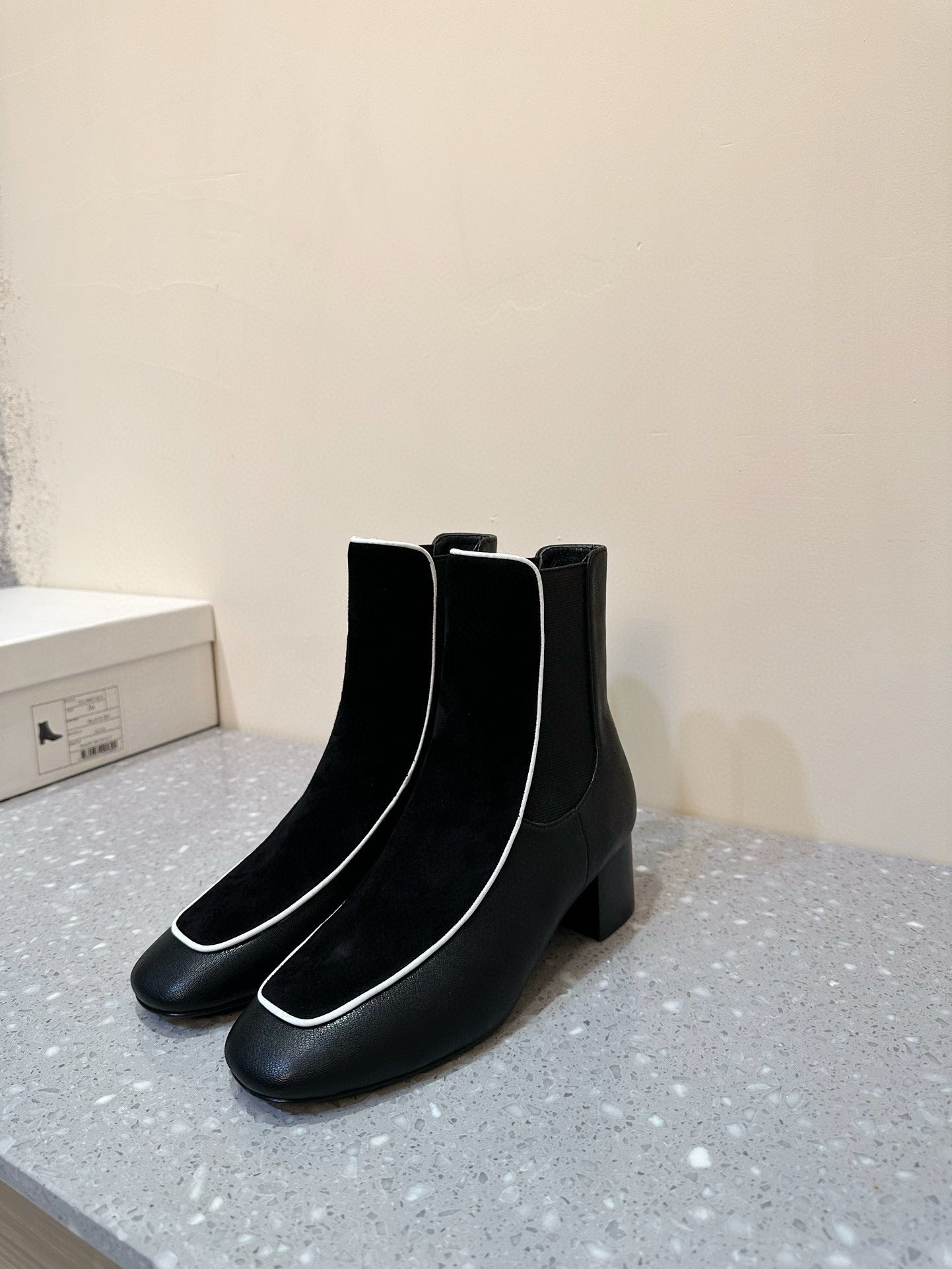 Velvet-trimmed leather ankle boots