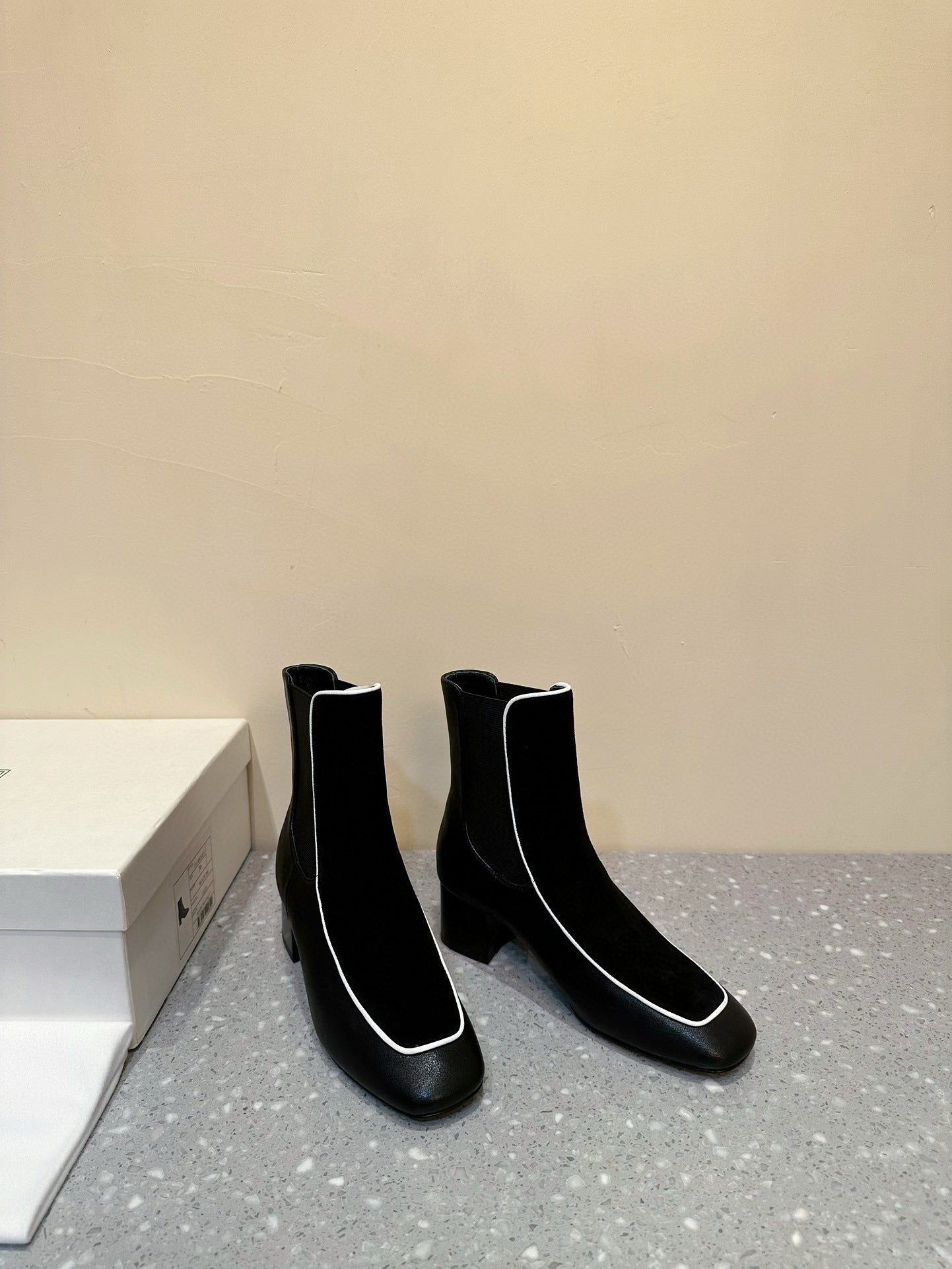 Velvet-trimmed leather ankle boots