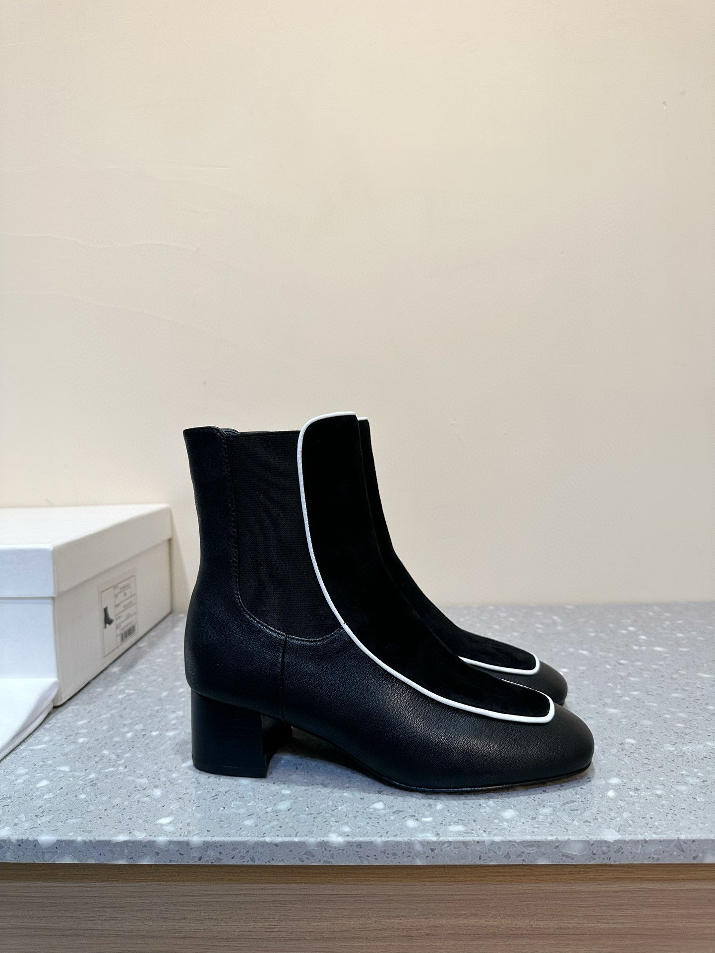 Velvet-trimmed leather ankle boots